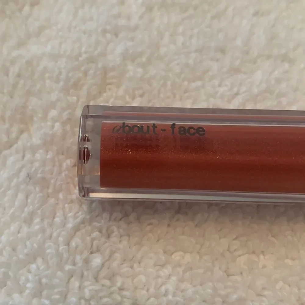 About Face Light Lock Lip Gloss